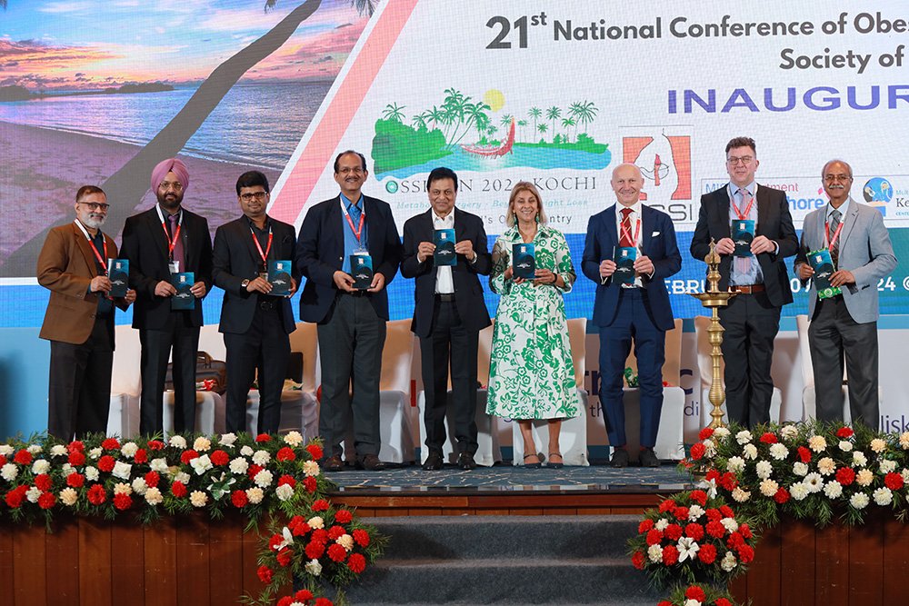 In the image, Dr. R. Padmakumar, Dr Gerhard Prager, President IFSO (International Federation of Surgeons for Obesity and Metabolic Surgery), Dr Praveen Raj, President OSSI, Shri S.K Abdulla, Managing Director, VPS Lakeshore Hospital, Dr Madhukar Pai, Dr Marina Kurian, President of American Society for Metabolic & Bariatric Surgery , Dr James Byrne, President of British Obesity & Metabolic Society (BOMSS)